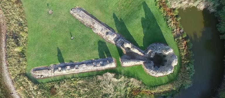 In the drone image taken directly over the ruin, you can see the bedding and the castle tower with bullet holes.